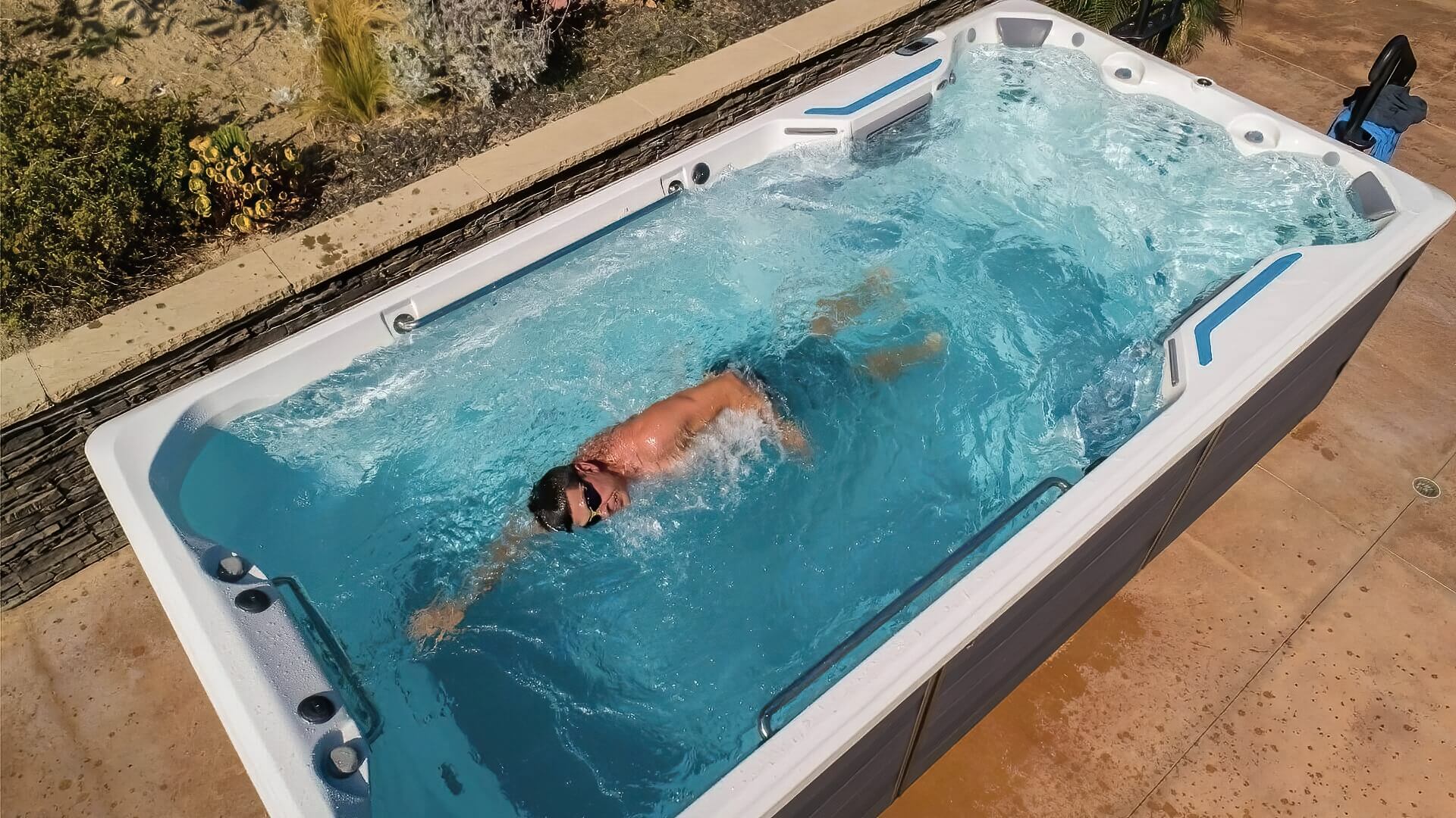 Man Using Swim Jet Installed In Pool Man Swim Jet Installed Pool