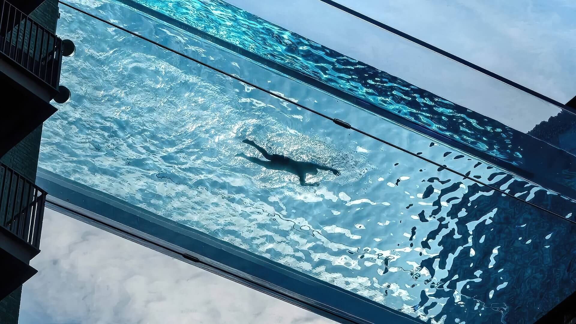 Person Swimming In Glass Bottom Pool Person Swimming Glass Bottom Pool