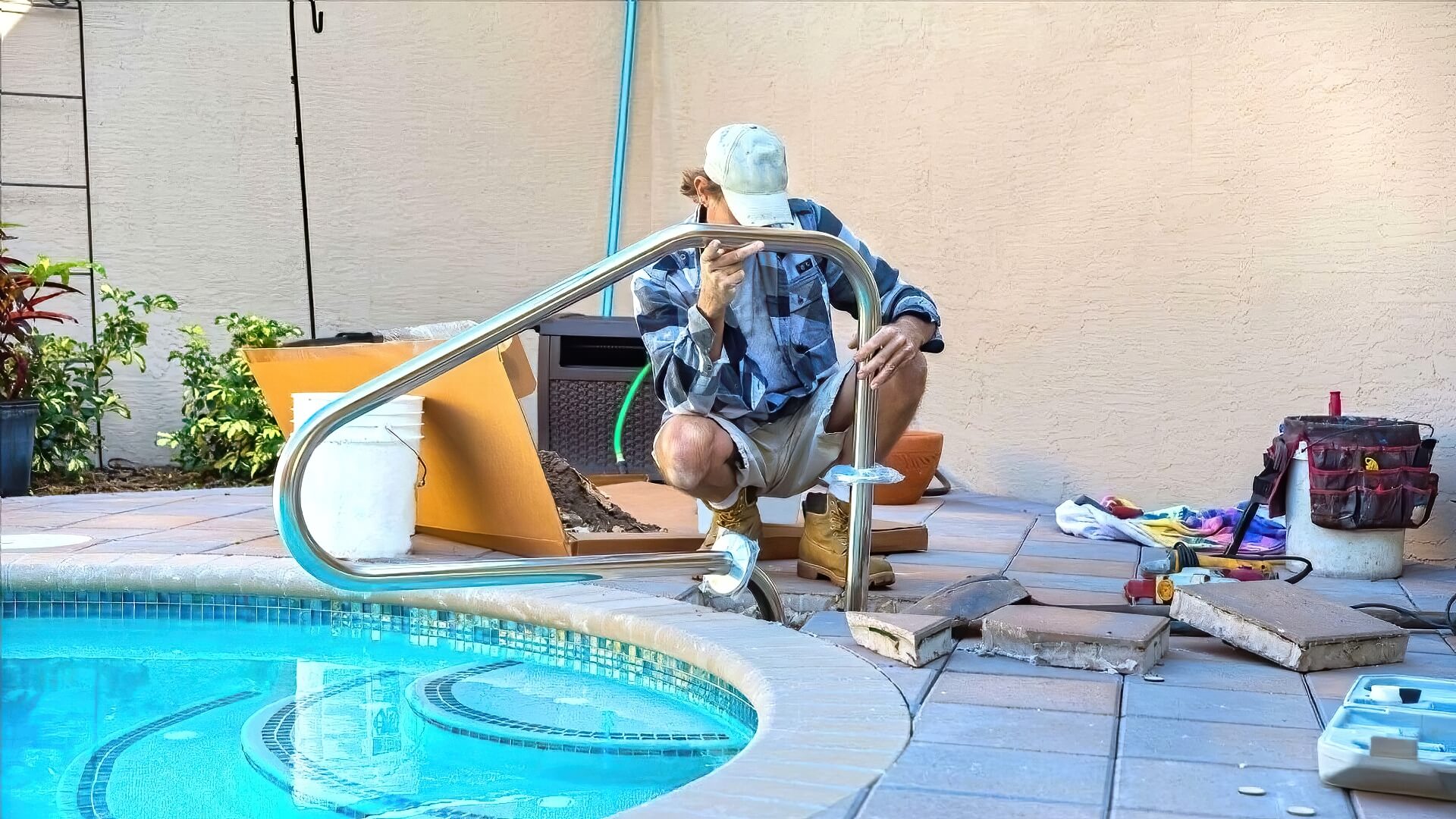 Tradesmen Installing Rail For Pool Tradesmen Installing Rail Pool